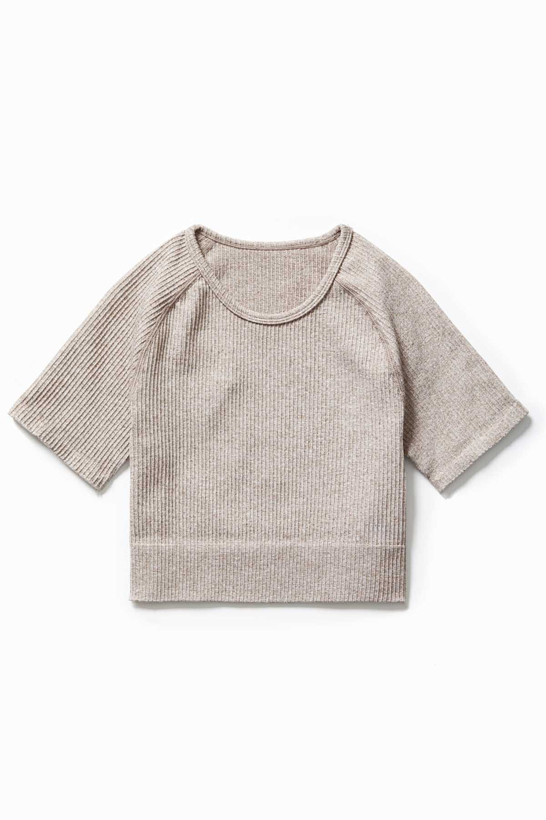 Close-up of soft ribbed fabric in Latte colour – IMLND seamless activewear