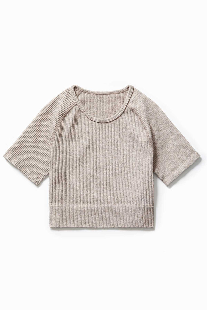 Close-up of soft ribbed fabric in Latte colour – IMLND seamless activewear