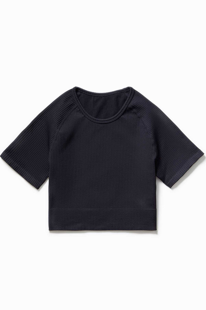 Close-up of soft ribbed fabric in Black colour – IMLND seamless activewear